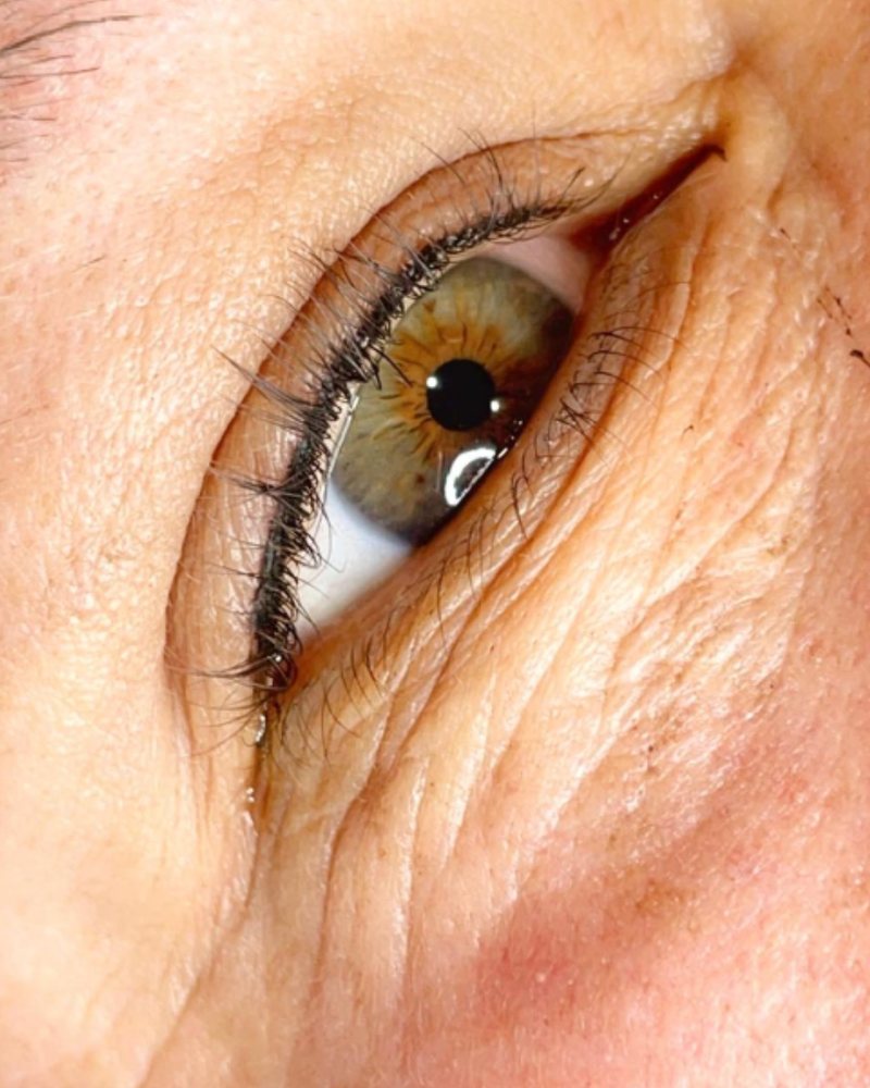 Fine permanent eyeliner along the upper lash line