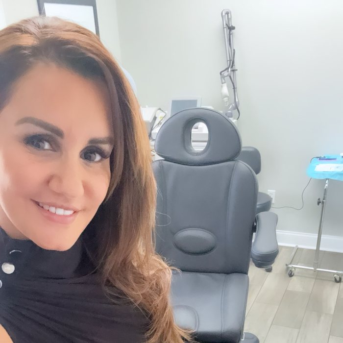 Angela in her treatment room at PURE Medical Spa